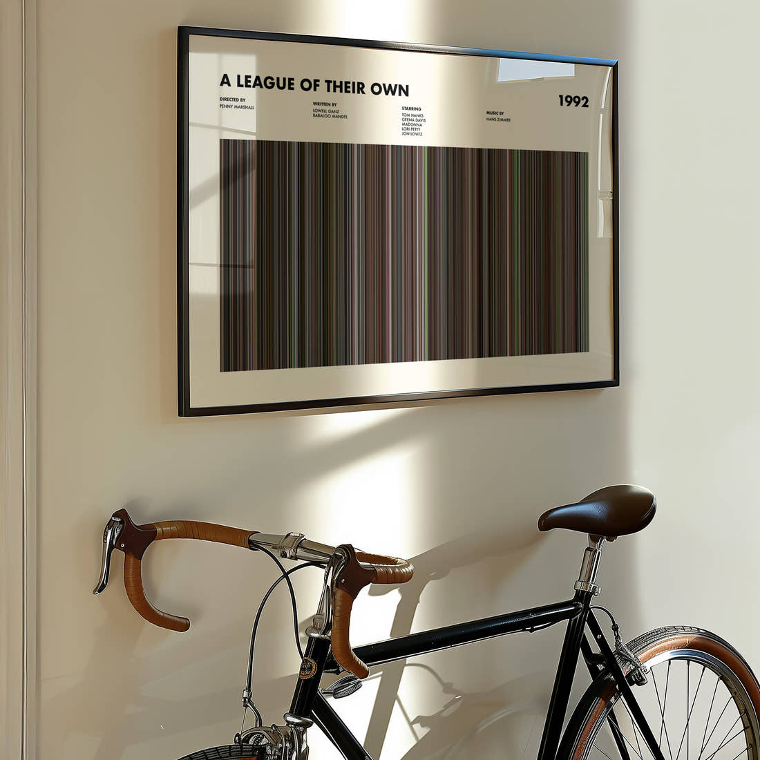 A League of Their Own Movie Barcode Poster framed on the wall of a styled room setting