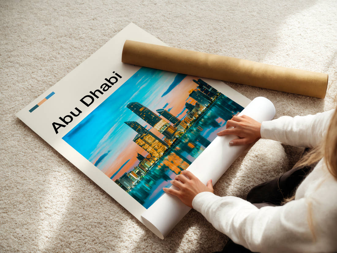 Abu Dhabi Skyline Reflection Travel Print being unrolled from its postal tube
