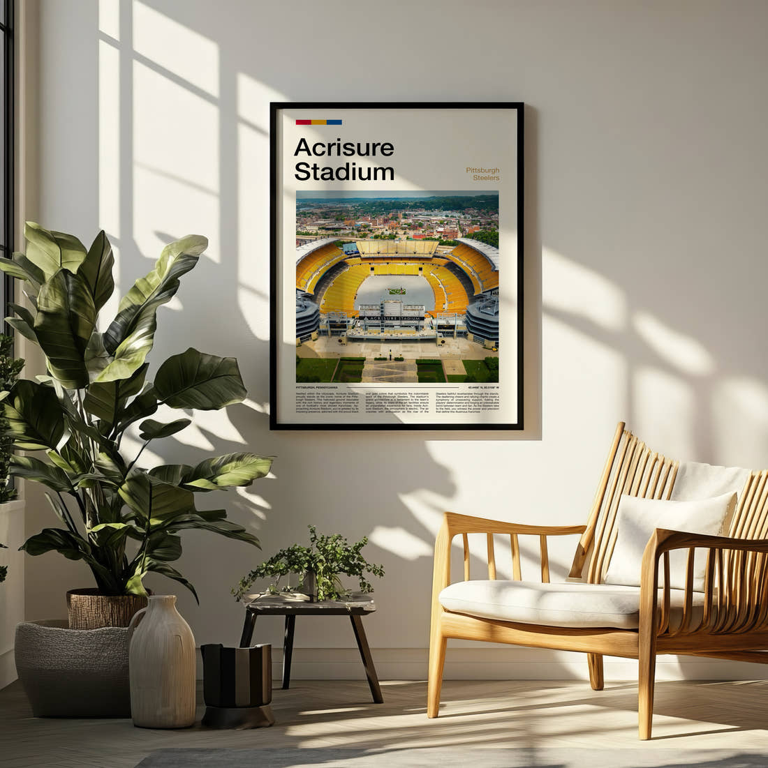 Acrisure Stadium Print framed on a pale wall beside houseplants