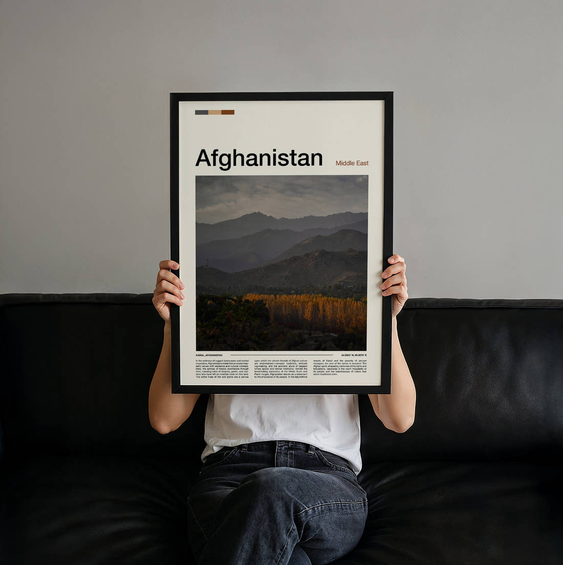 Afghanistan Autumn Trees Below Mountains Travel Print held up by hand to show the size of the print