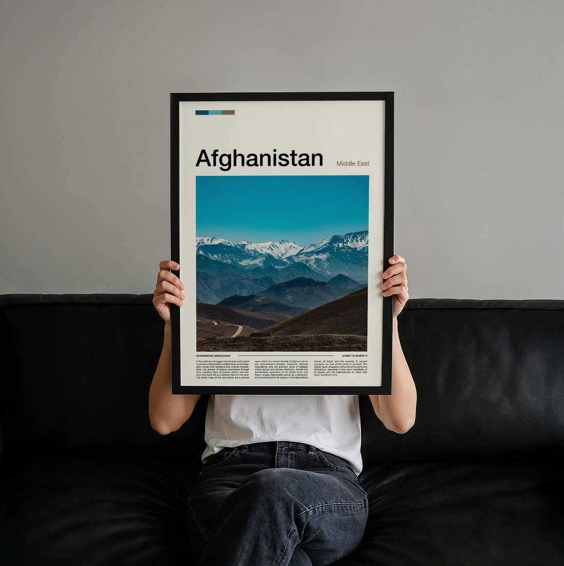 Afghanistan Snow Capped Mountain Range Travel Print held up by hand to show the size of the print