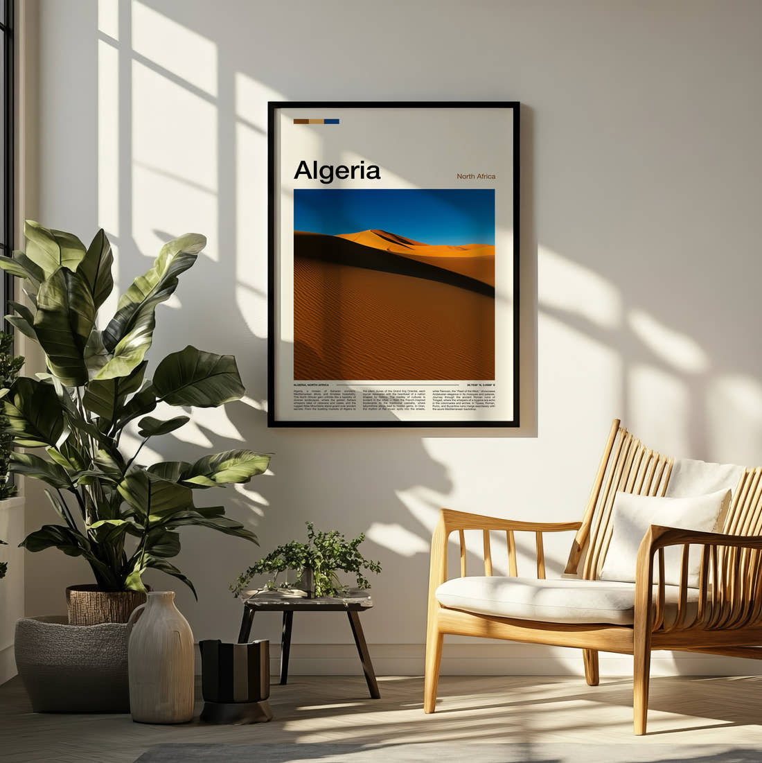 Algeria Sand Dunes Travel Print framed on a pale wall beside houseplants