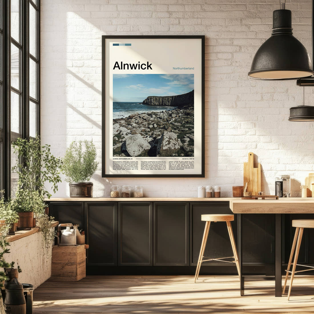 Alnwick Rocky Coastal Cliffs Travel Print framed on the wall of a bright kitchen and dining space