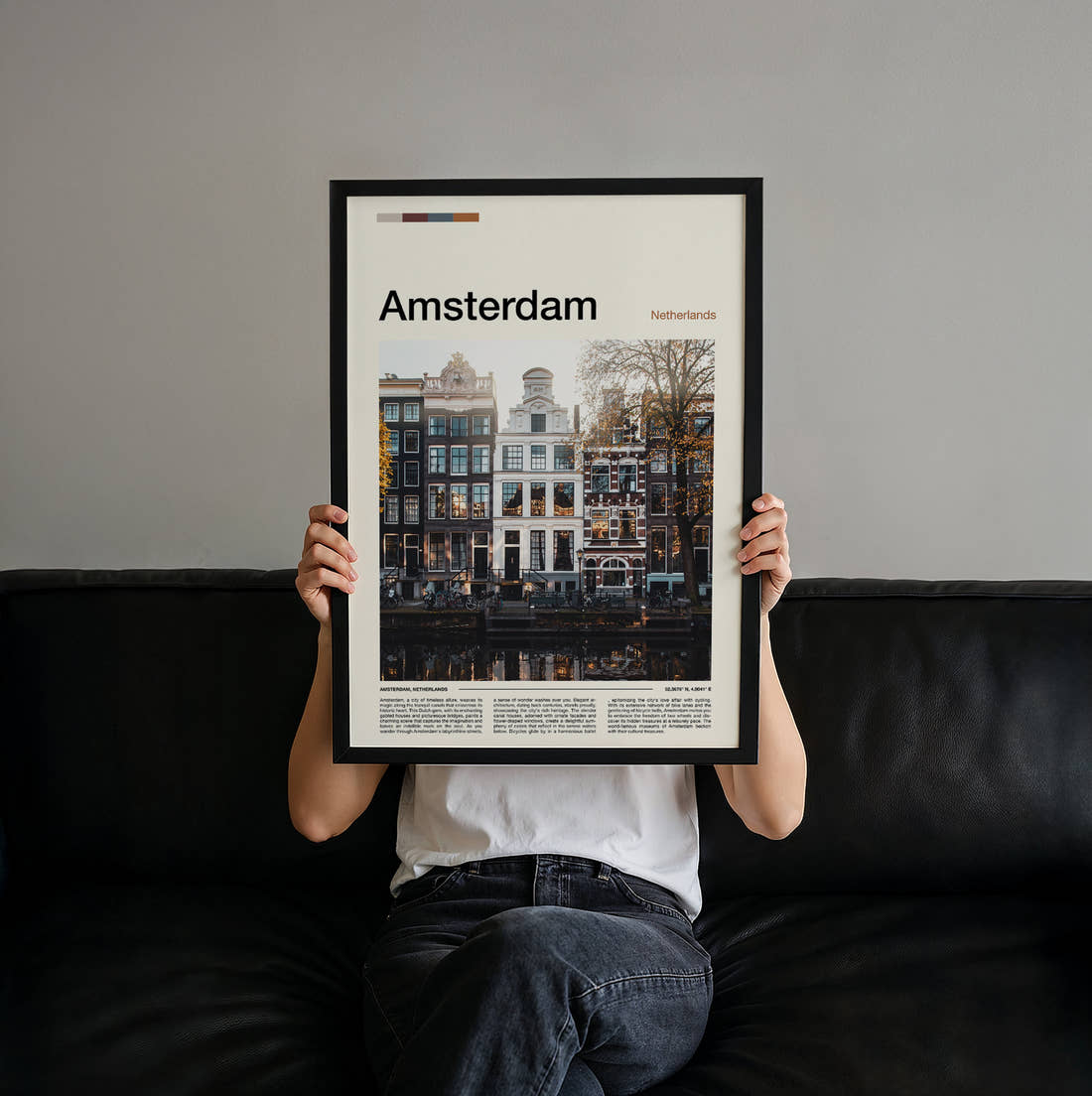 Amsterdam Canal Houses Travel Print held up by hand to show the size of the print