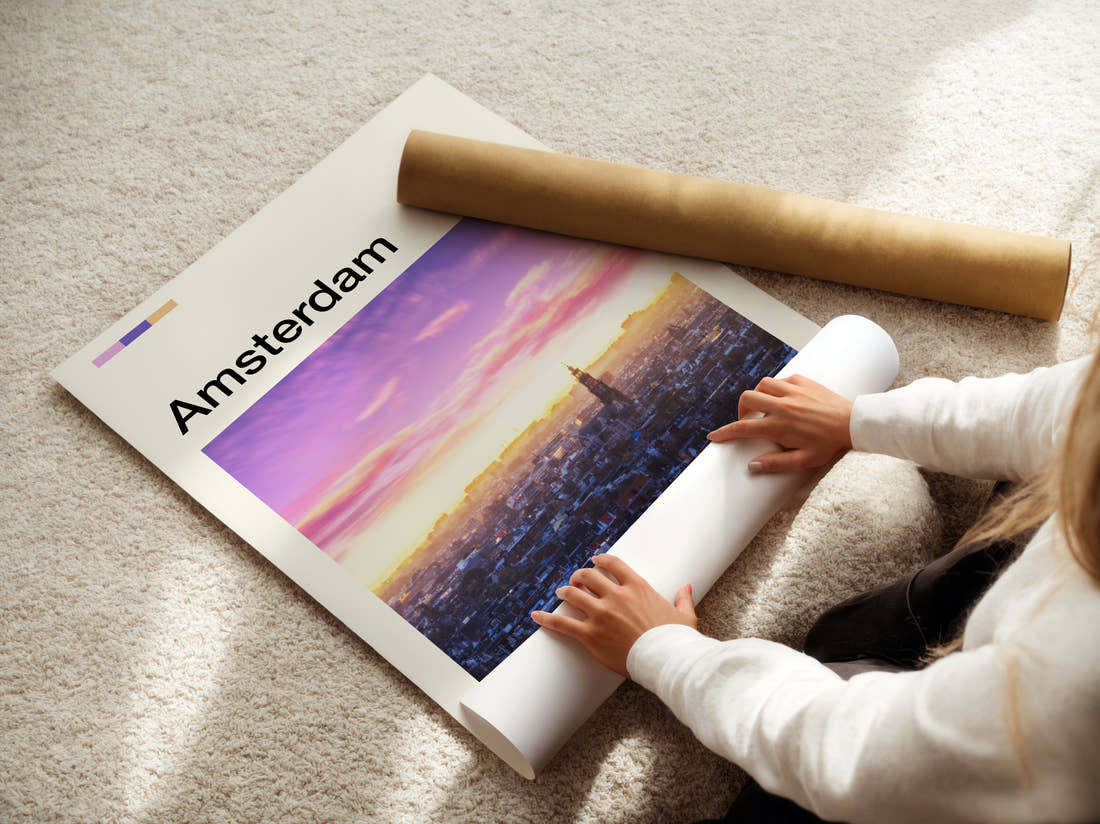Amsterdam City Skyline At Sunset Travel Print being unrolled from its postal tube