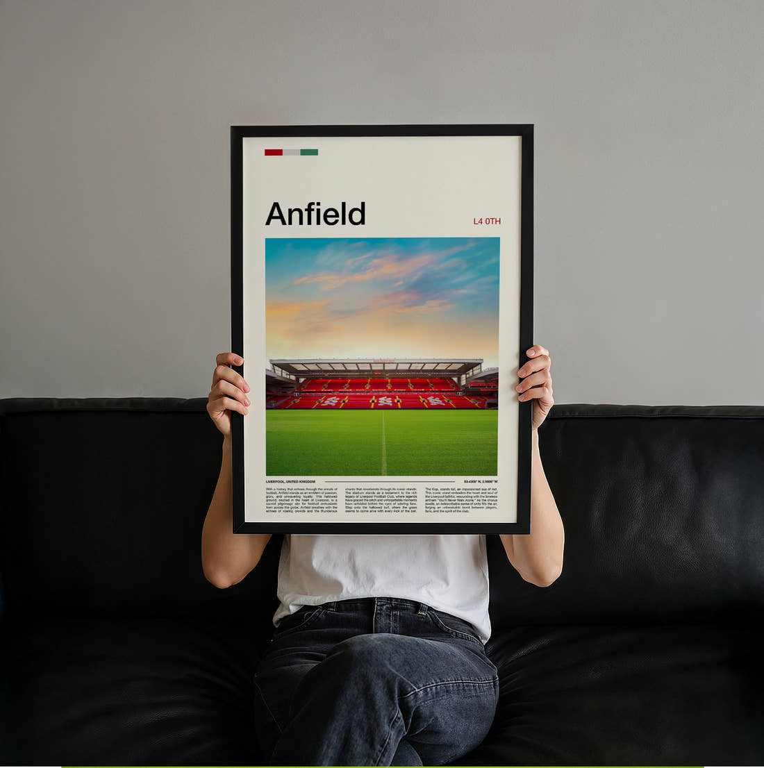 Anfield Stadium Print held up by hand to show the size of the print