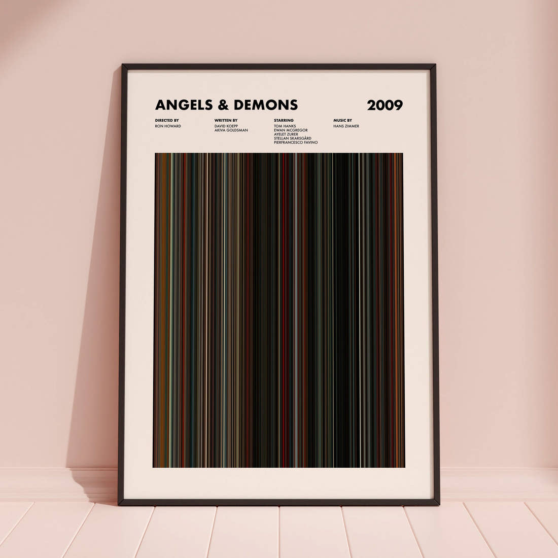 Angels & Demons Movie Barcode Poster framed and leaning against a coloured wall