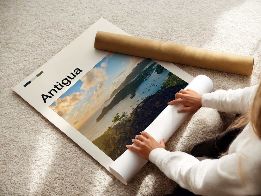 Antigua Harbour From Above Travel Print being unrolled from its postal tube