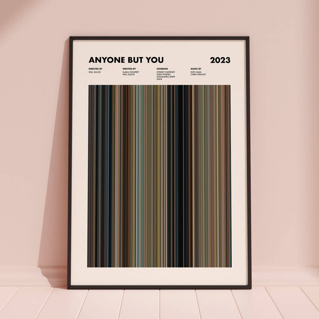 Anyone but You Movie Barcode Poster framed and leaning against a coloured wall