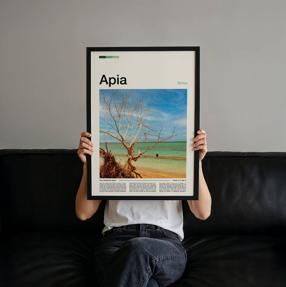 Apia Bare Tree On The Beach Travel Print held up by hand to show the size of the print