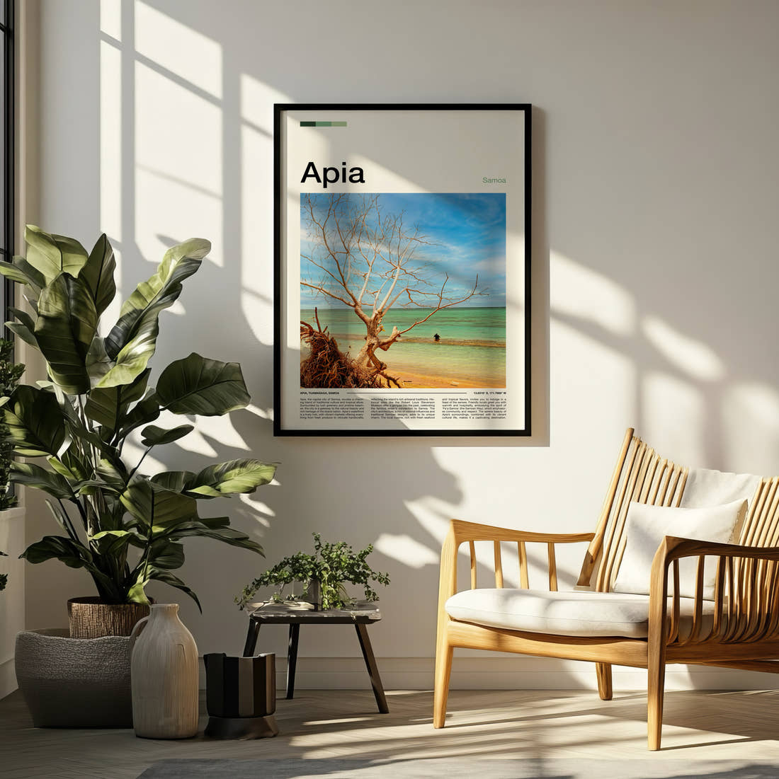 Apia Bare Tree On The Beach Travel Print framed on a pale wall beside houseplants