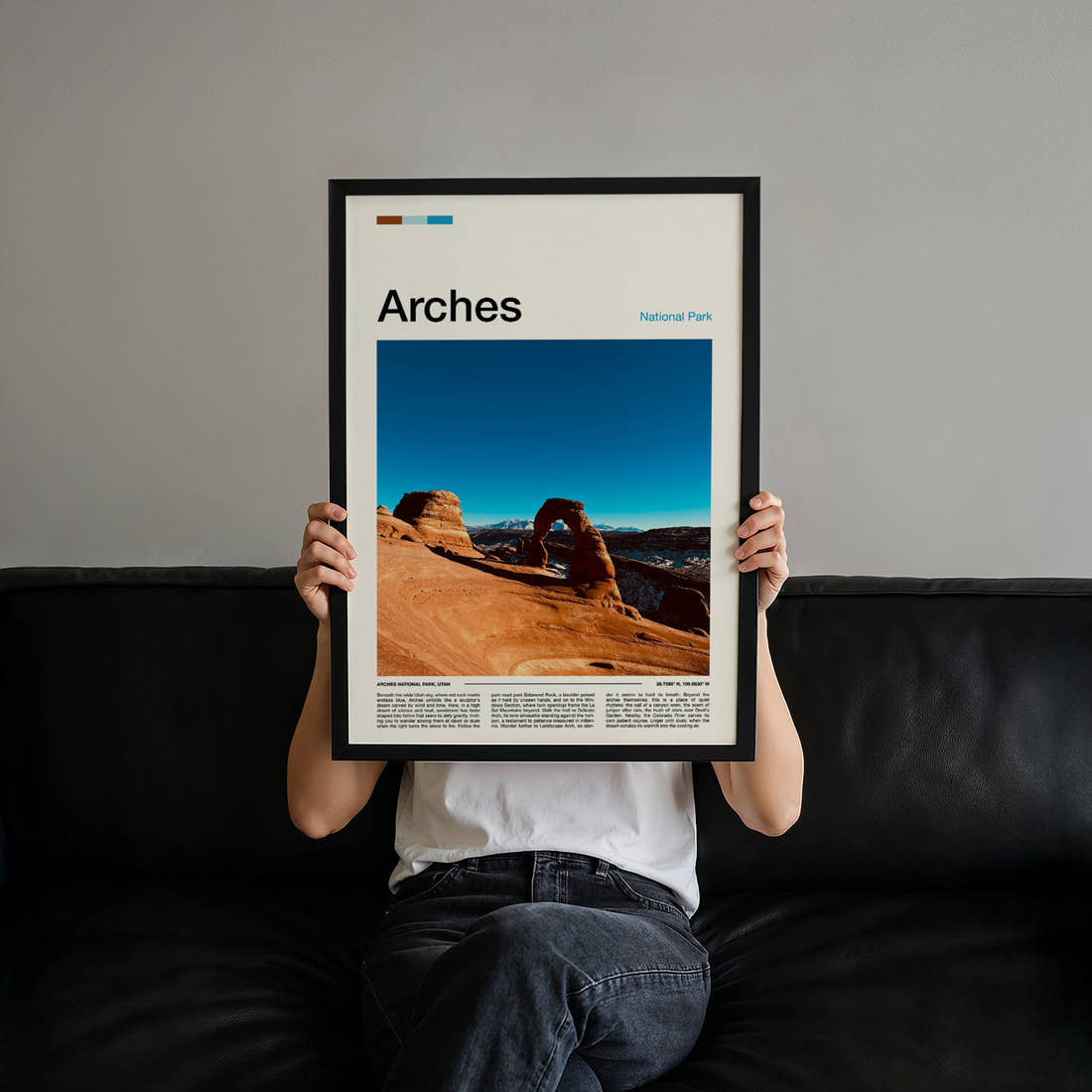 Arches Delicate Arch View Travel Print held up by hand to show the size of the print