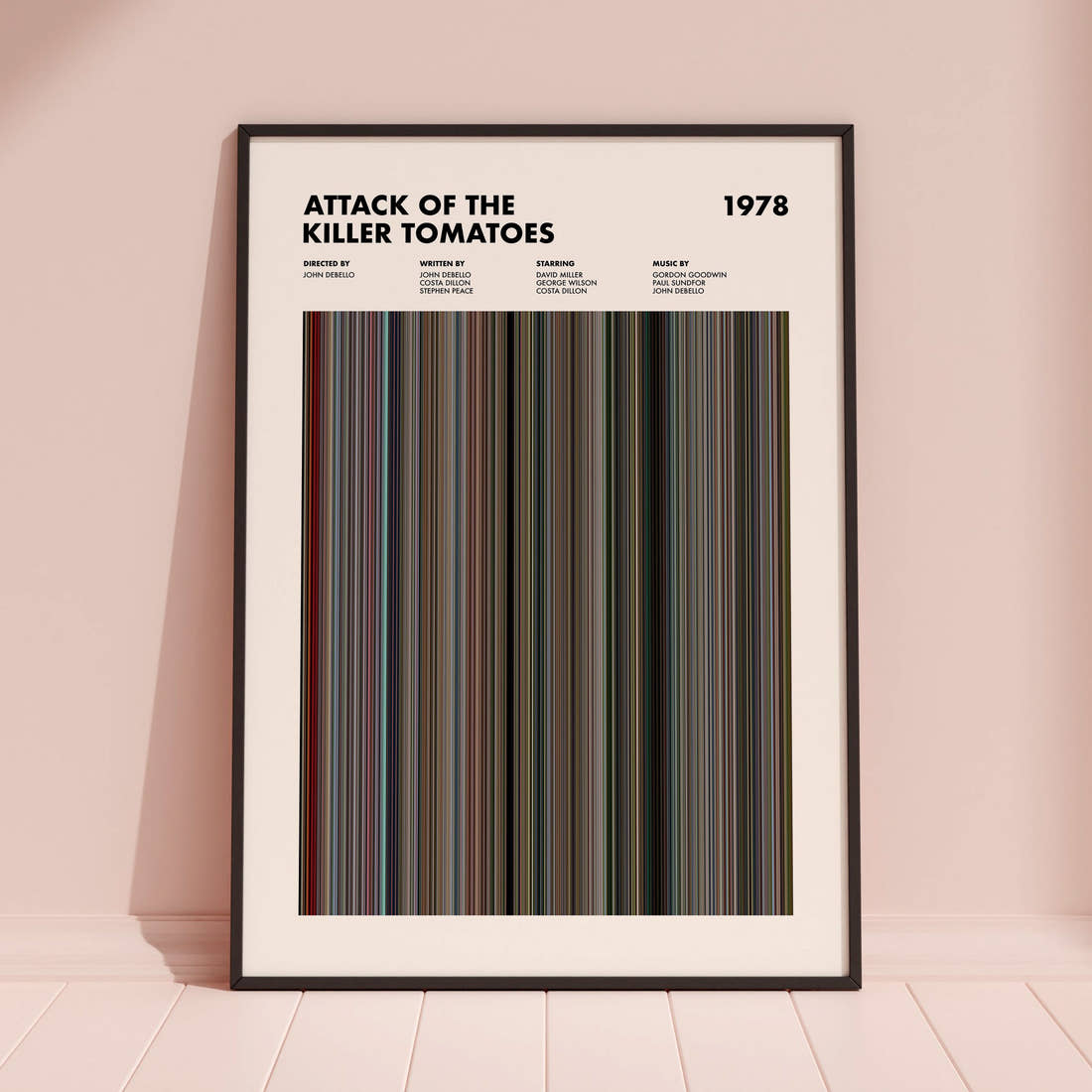 Attack of the Killer Tomatoes Movie Barcode Poster framed and leaning against a coloured wall