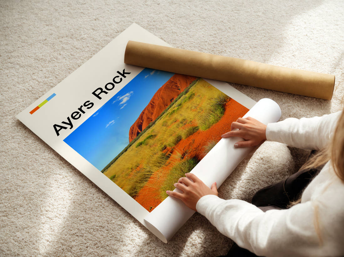 Ayers Rock Uluru Travel Print being unrolled from its postal tube
