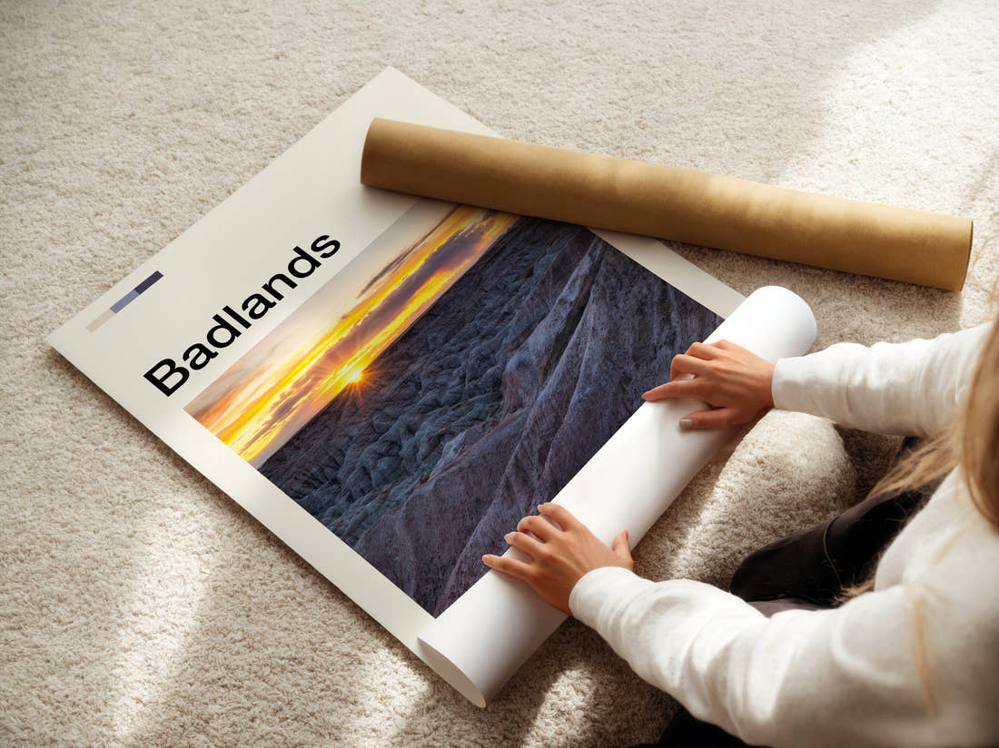 Badlands Sunset Over The Ridges Travel Print being unrolled from its postal tube