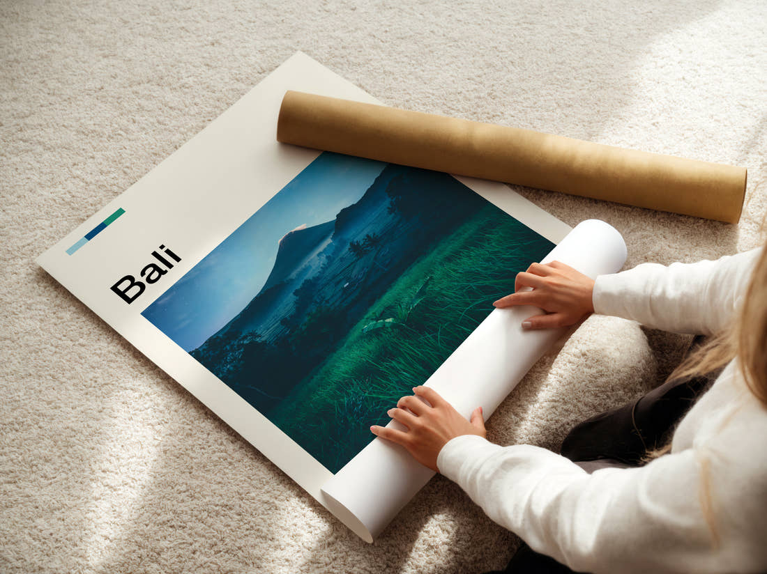 Bali Volcano At Dusk Travel Print being unrolled from its postal tube
