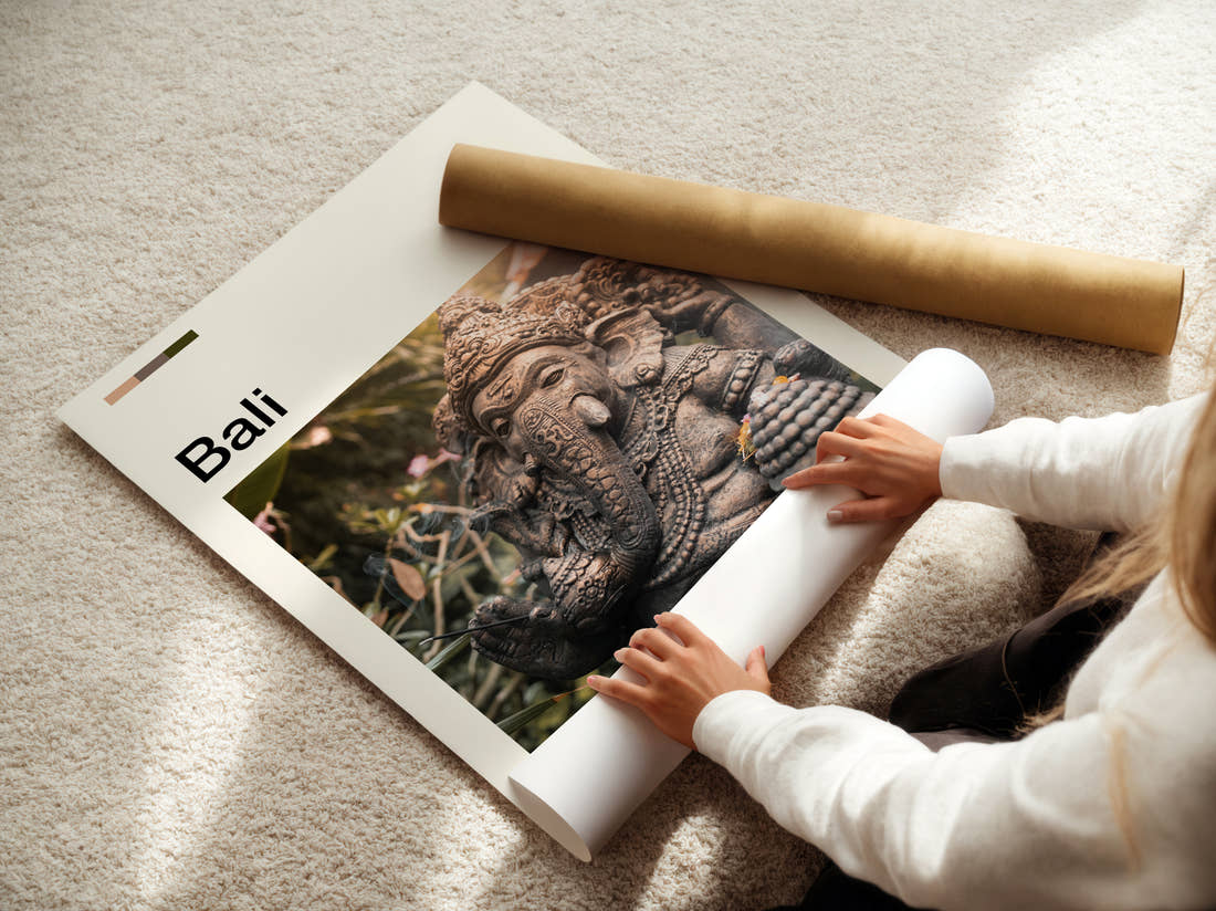 Bali Ganesha Statue Travel Print being unrolled from its postal tube