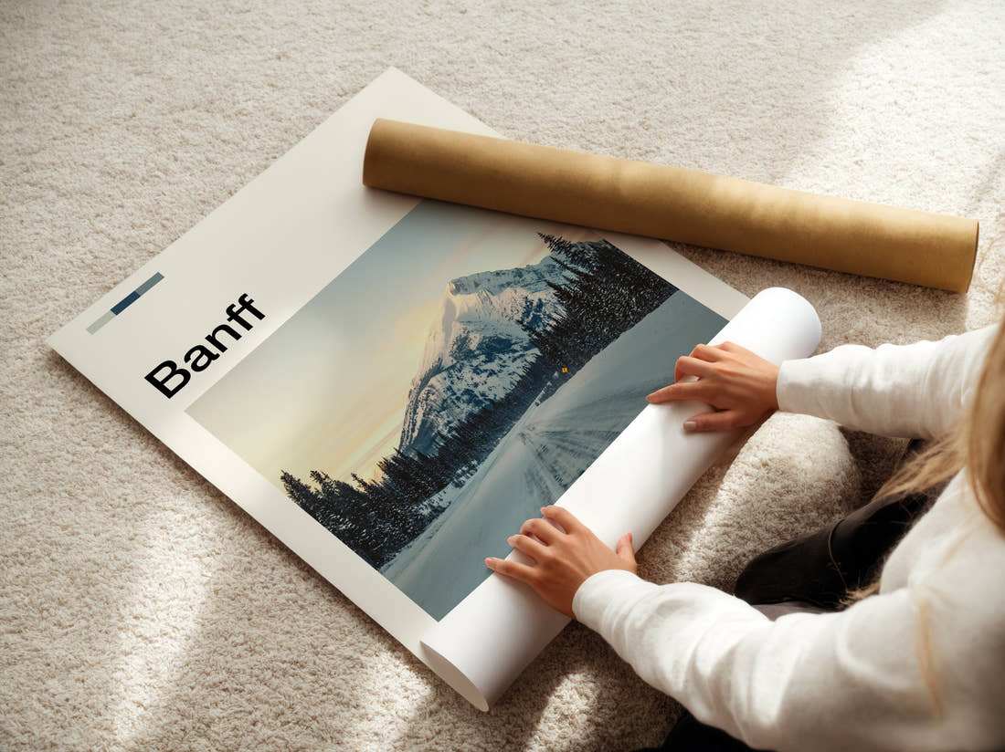 Banff Snowy Road To Mountain Travel Print being unrolled from its postal tube