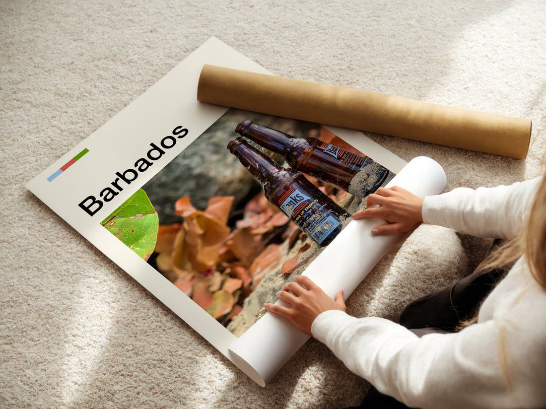 Barbados Beer Bottles On Sand Travel Print being unrolled from its postal tube