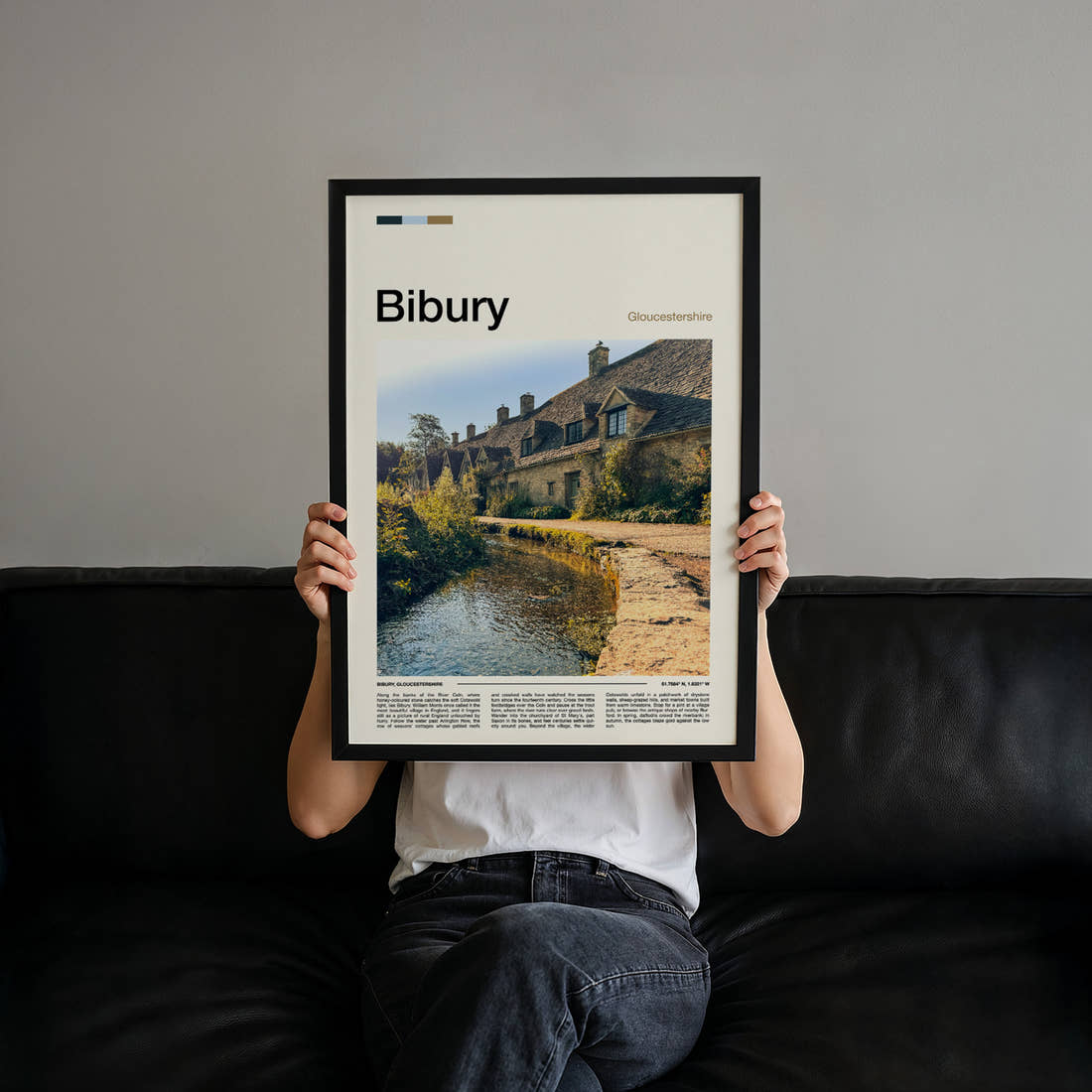 Bibury Riverside Cottage Row Travel Print held up by hand to show the size of the print