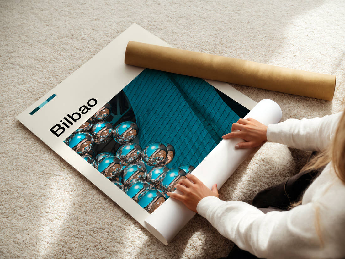 Bilbao Mirrored Sphere Sculpture Travel Print being unrolled from its postal tube