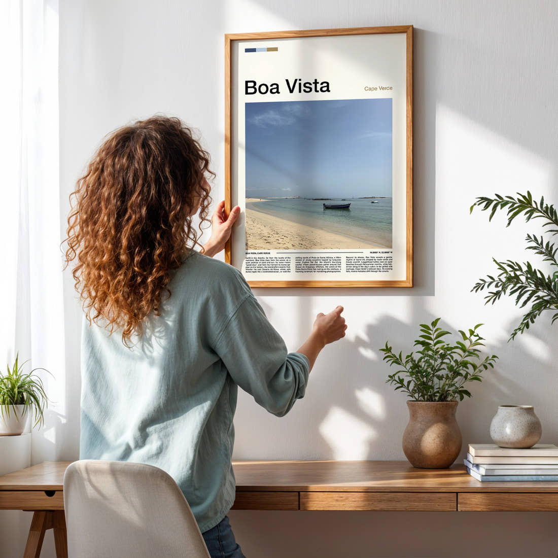 Boa Vista Turquoise Bay Shoreline Travel Print framed on a pale wall beside houseplants