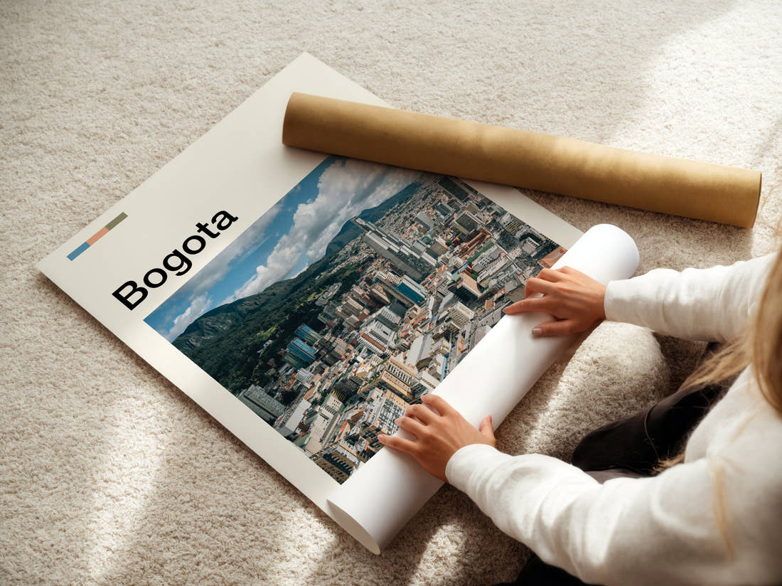 Bogota City Below The Mountains Travel Print being unrolled from its postal tube