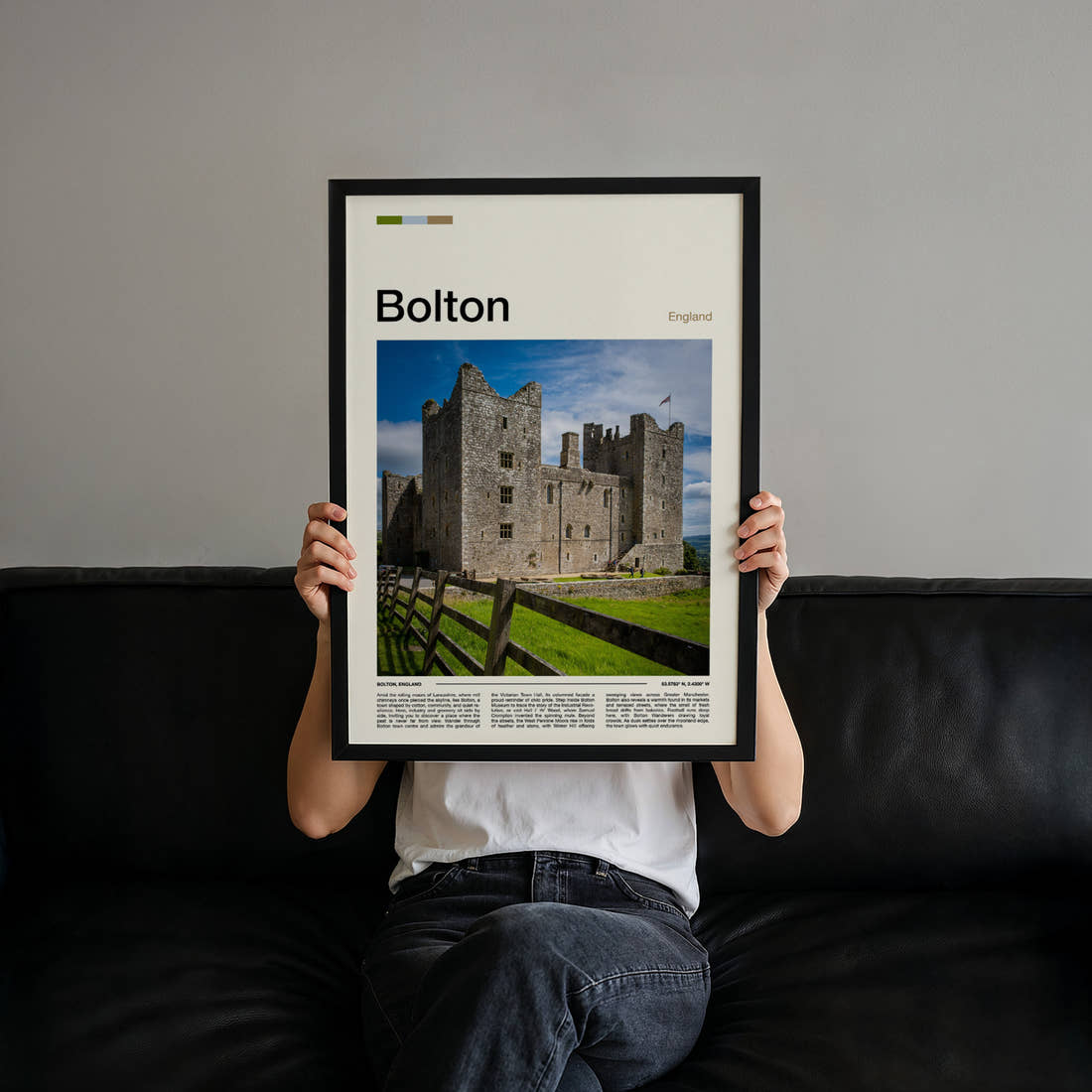 Bolton Stone Castle Facade Travel Print held up by hand to show the size of the print