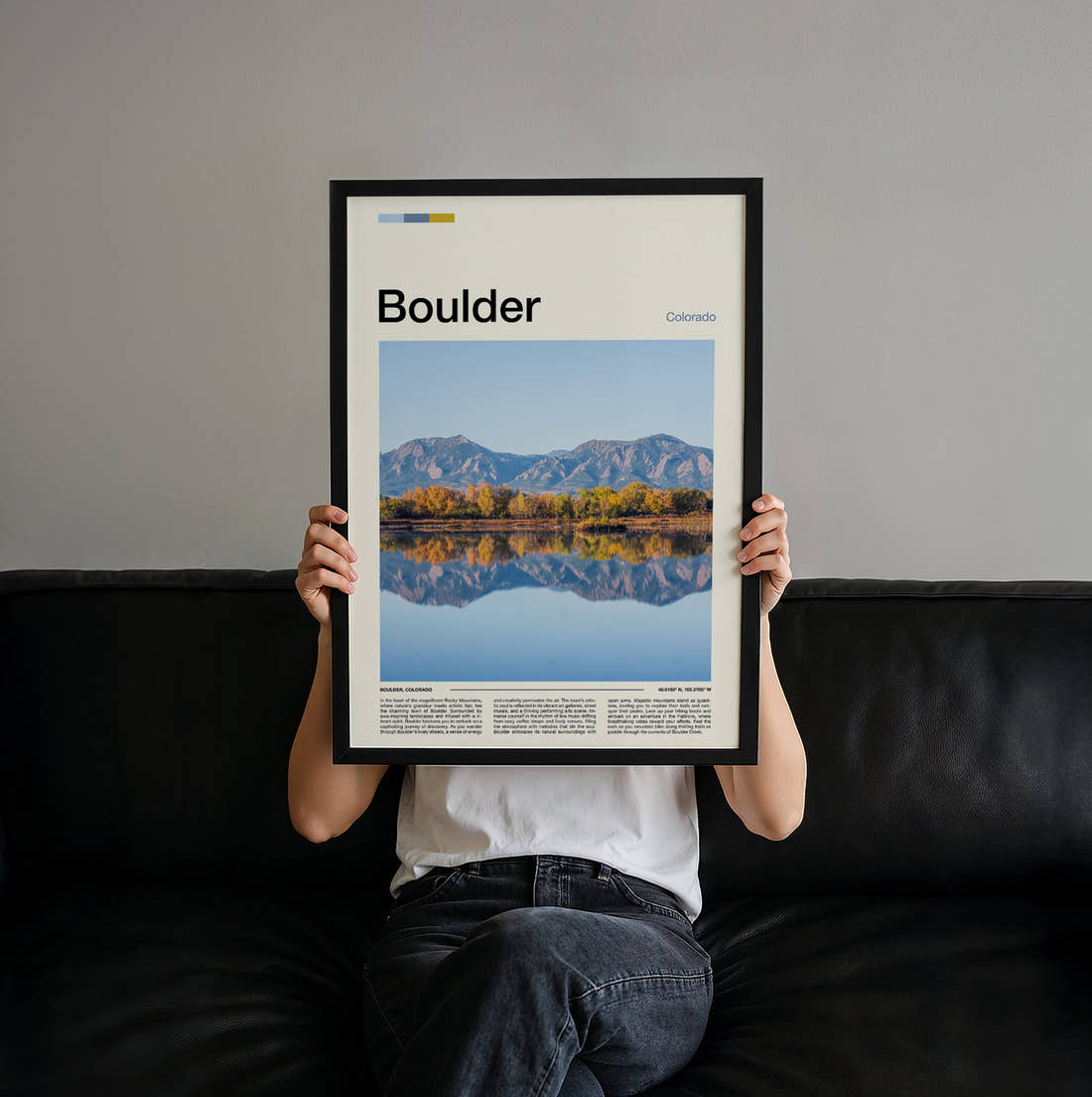 Boulder Mountains Reflected In Water Travel Print held up by hand to show the size of the print