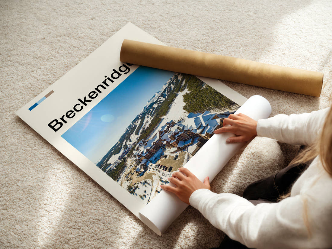Breckenridge Snowy Resort Village Travel Print being unrolled from its postal tube