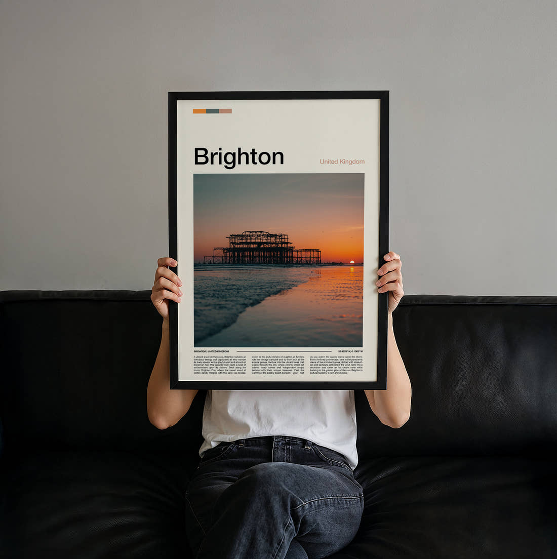 Brighton West Pier Ruins Travel Print held up by hand to show the size of the print
