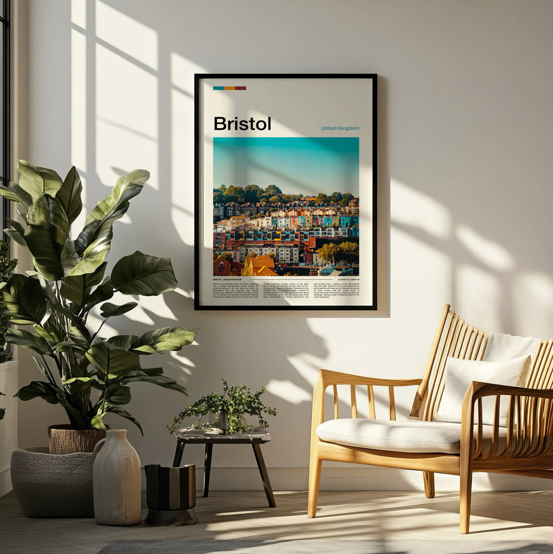 Bristol Colourful Terraced Houses Travel Print framed on a pale wall beside houseplants