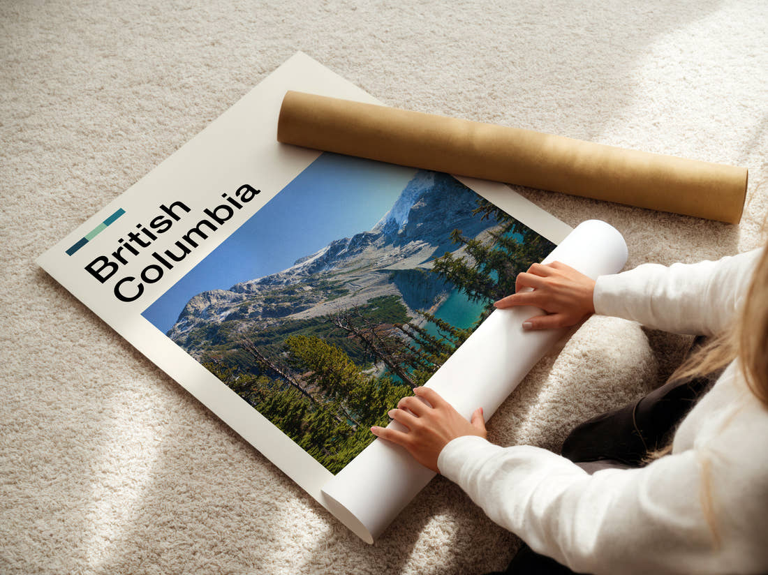British Columbia Turquoise Lake And Mountains Travel Print being unrolled from its postal tube
