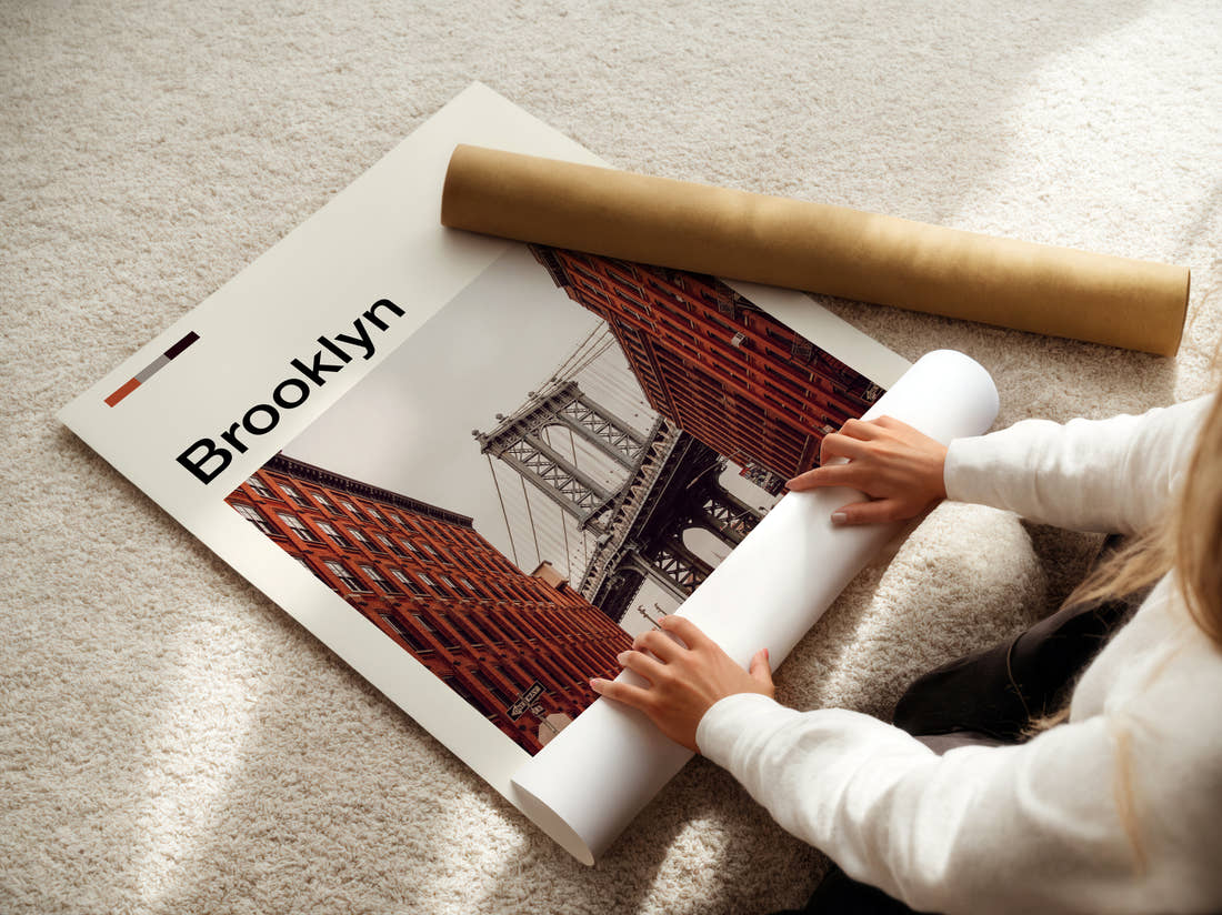 Brooklyn Manhattan Bridge Between Red Brick Walls Travel Print being unrolled from its postal tube