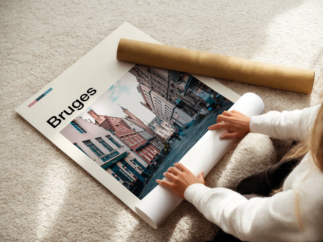Bruges Cobbled Street Travel Print being unrolled from its postal tube