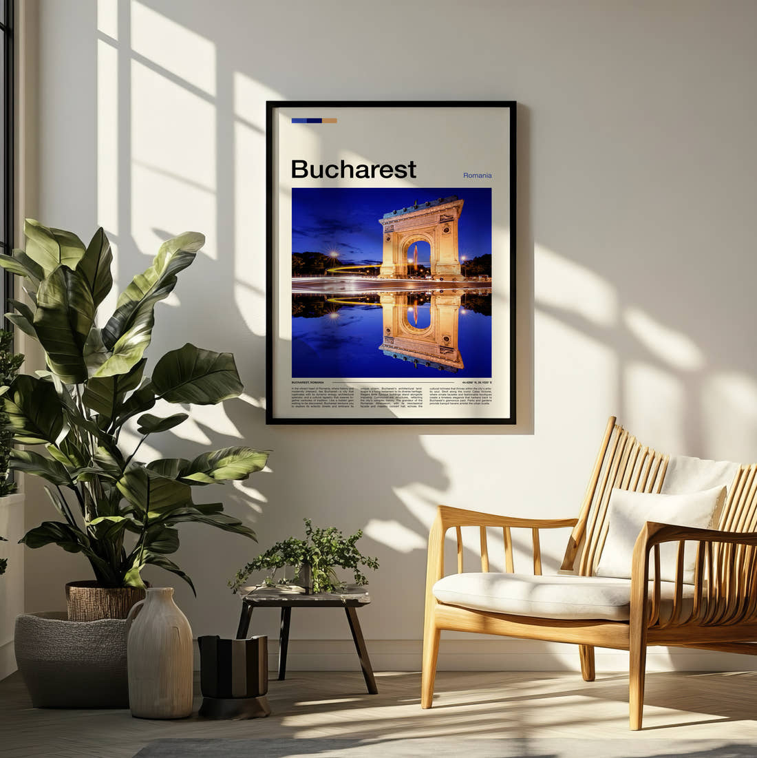 Bucharest Arch Of Triumph Travel Print framed on a pale wall beside houseplants