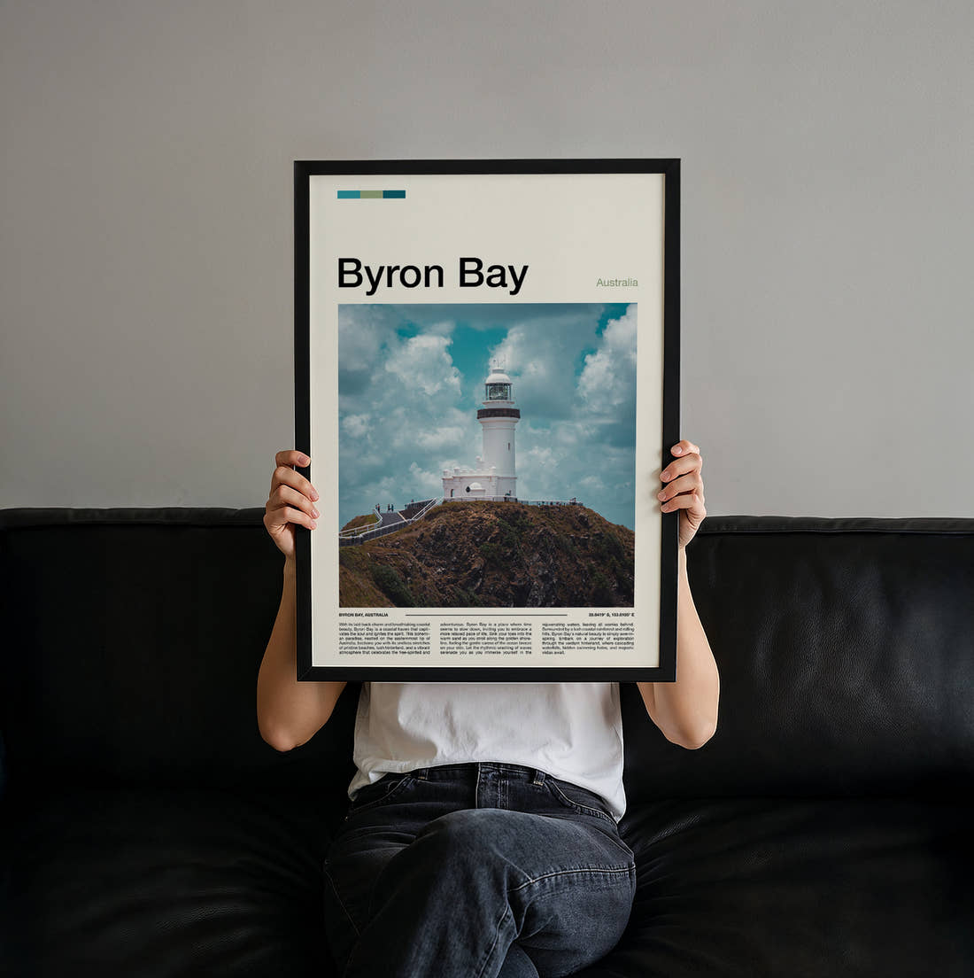 Byron Bay Clifftop Lighthouse Travel Print held up by hand to show the size of the print