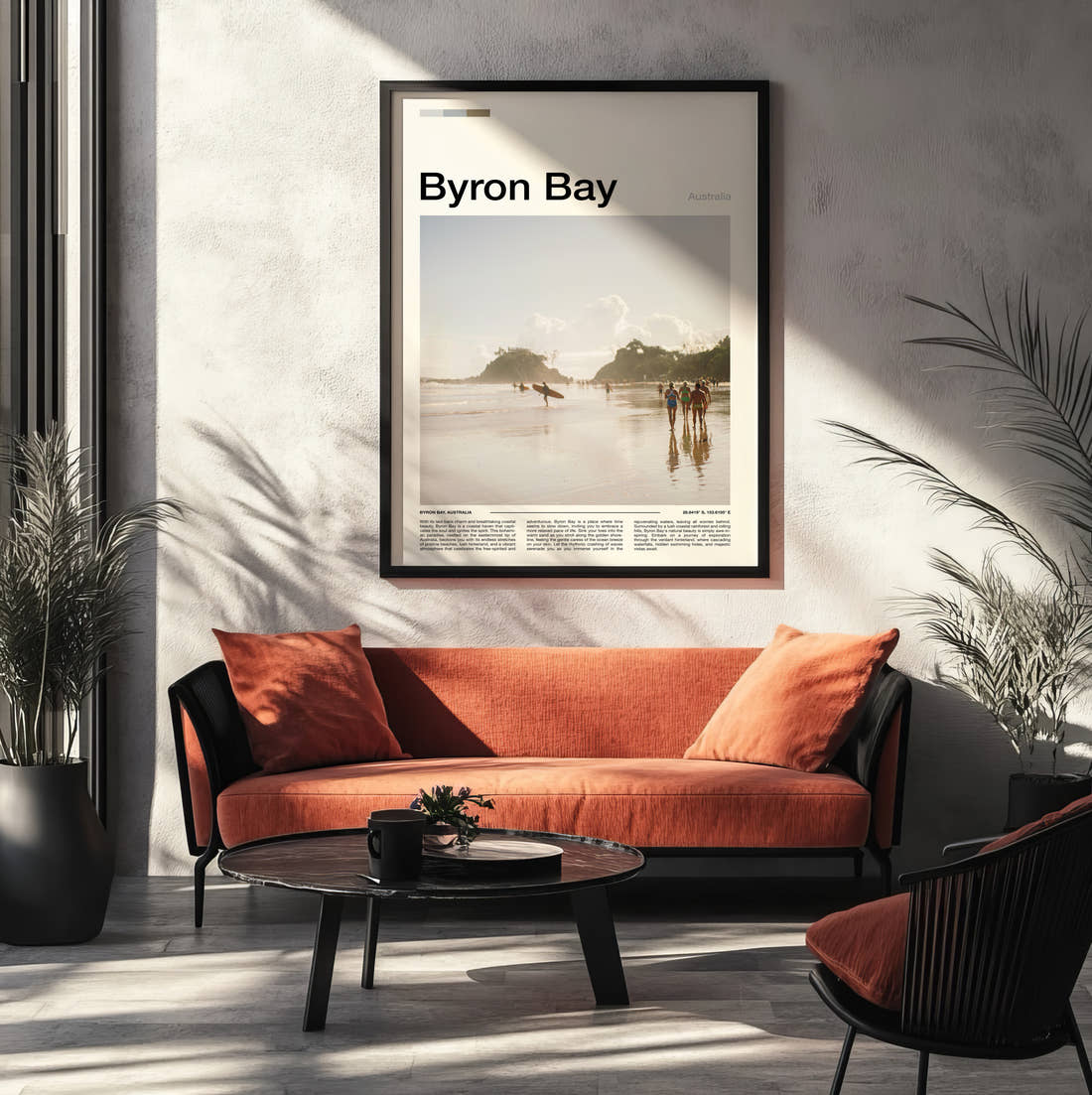 Byron Bay Surfers On The Beach Travel Print framed on the wall of a modern living room