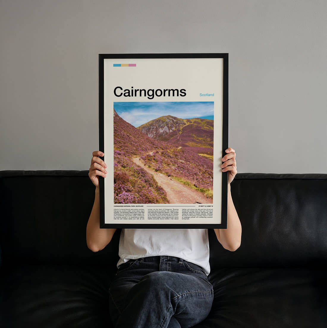 Cairngorms Purple Heather Hillside Travel Print held up by hand to show the size of the print