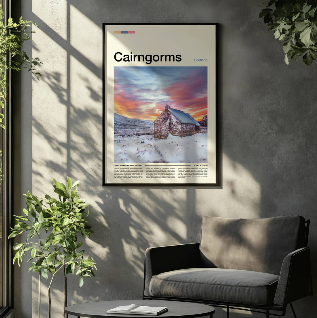 Cairngorms Cottage In The Snow Travel Print framed on the wall of a relaxed living room
