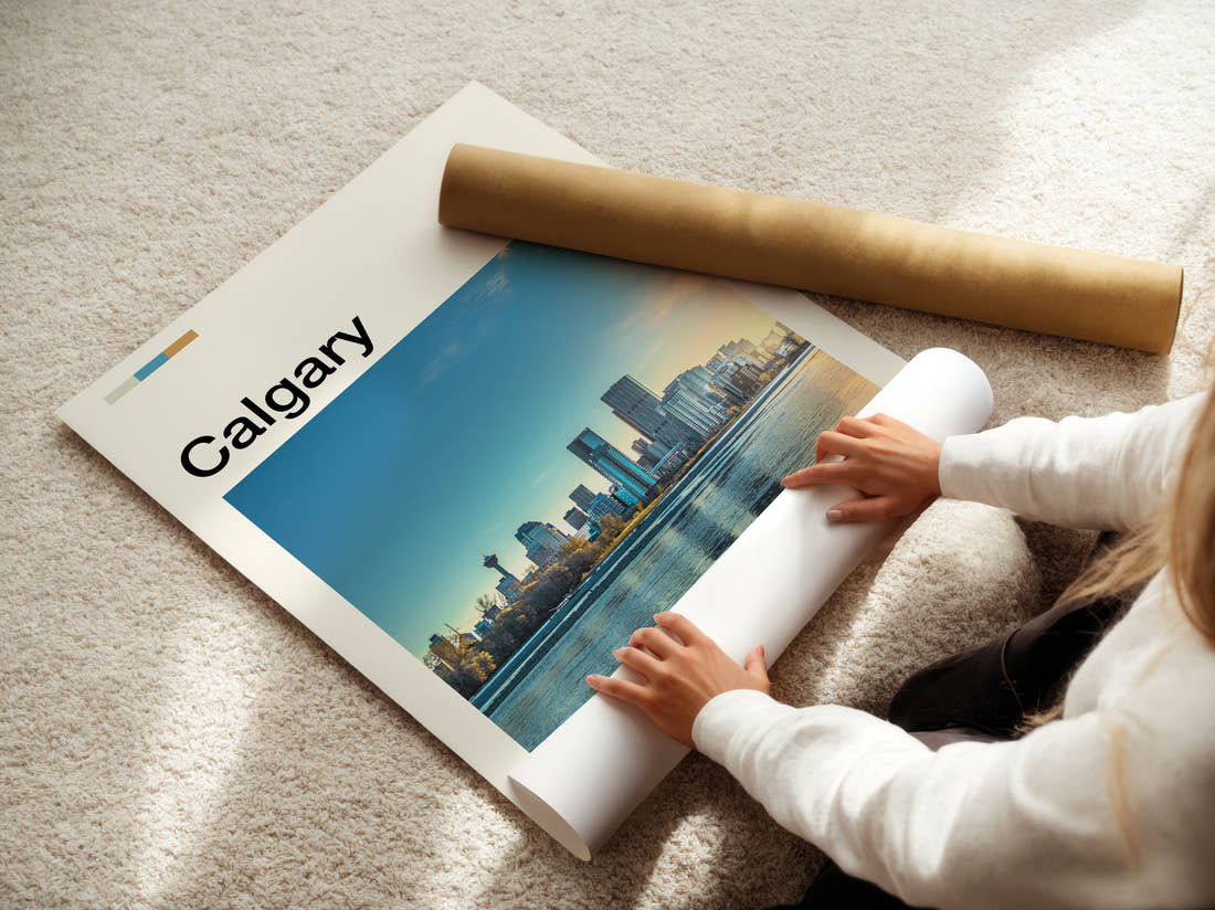 Calgary Skyline Across The River Travel Print being unrolled from its postal tube