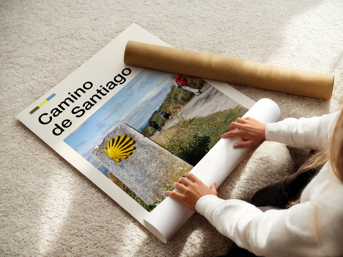 Camino De Santiago Scallop Shell Waymarker Travel Print being unrolled from its postal tube