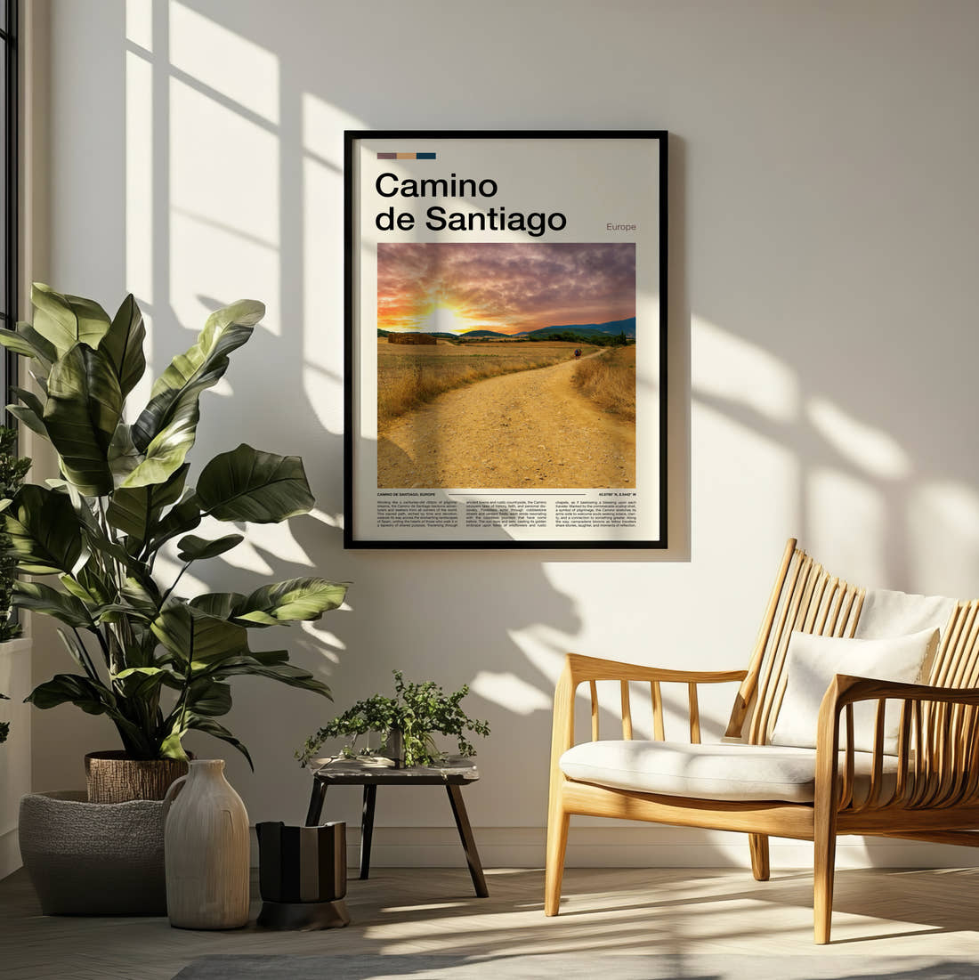 Camino De Santiago Sunset Over Fields Travel Print framed on a pale wall beside houseplants