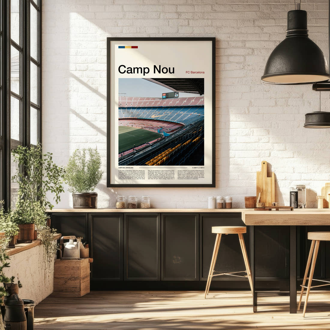 Camp Nou Stadium Print framed on the wall of a bright kitchen and dining space