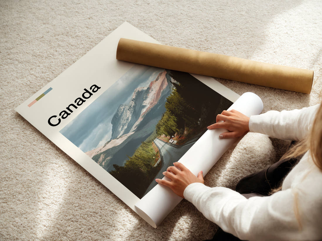Canada Mountain Road Travel Print being unrolled from its postal tube