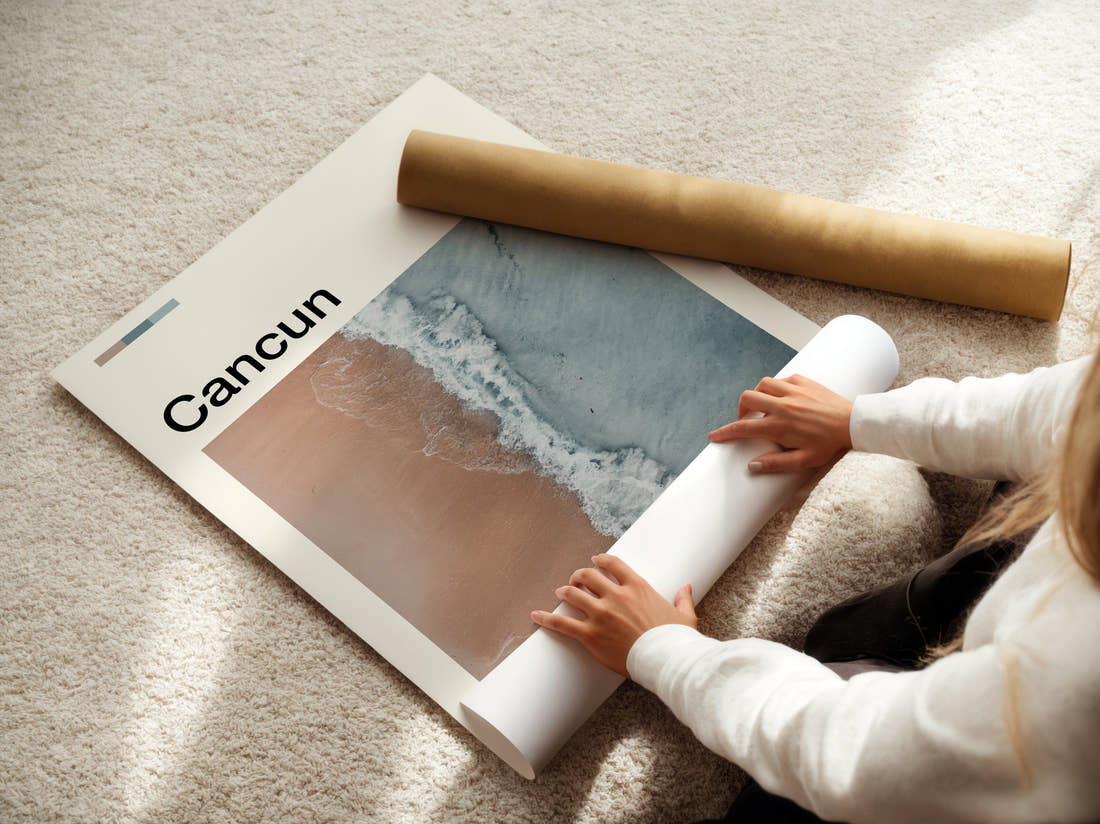 Cancun Aerial View Of Beach Travel Print being unrolled from its postal tube