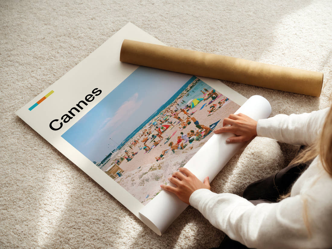 Cannes Crowded Beach Travel Print being unrolled from its postal tube