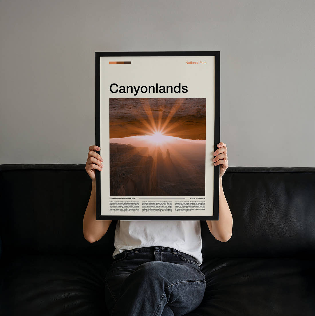 Canyonlands Sunrise Through The Arch Travel Print held up by hand to show the size of the print