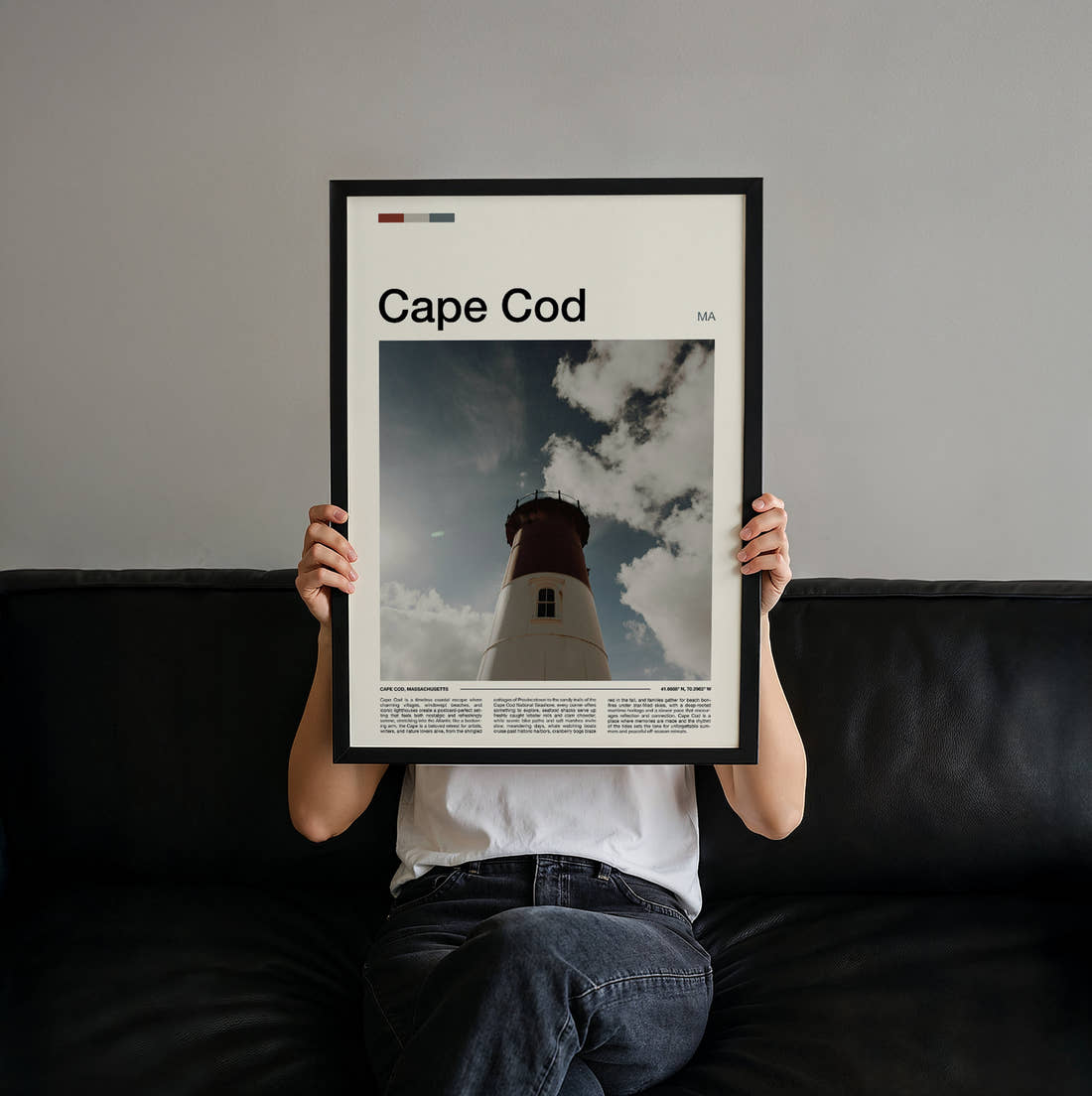 Cape Cod Lighthouse Travel Print held up by hand to show the size of the print