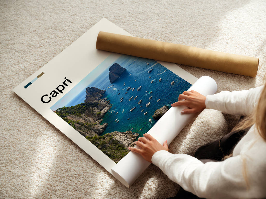 Capri Faraglioni Sea Stacks Travel Print being unrolled from its postal tube